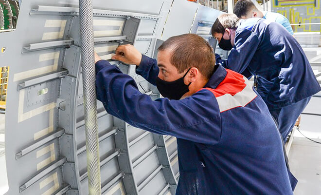 Aircraft mechanics working through the COVID 19 global pandemic